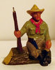 Durso Cowboy sitzend mit Gewehr