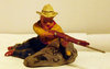 Solido Cowboy Firirng Rifle Behind Rock